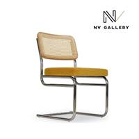 Lorenzo chaise design velours jaune moutarde, cannage et métal chromé