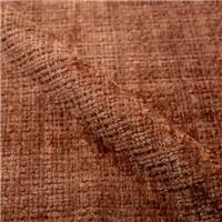 Denna chaise en velours chenillé terracotta