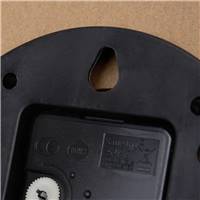 Horloge murale ronde en bois noir The World ø60