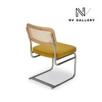 Lorenzo chaise design velours jaune moutarde, cannage et métal chromé