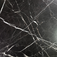 Hautma table basse carré marbre noir structure laiton