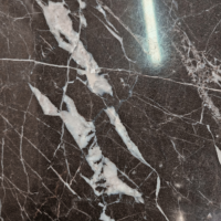 Hautma table basse carré marbre noir structure laiton