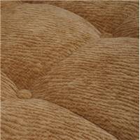 Klav fauteuil en tissu texturé camel capitonné tube acier chromé
