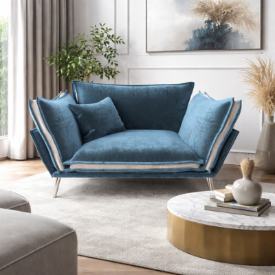 Laura fauteuil en velours bleu clair et pieds argentés