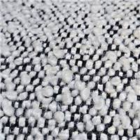 Alba fauteuil effet laine bouclette moucheté blanc noir