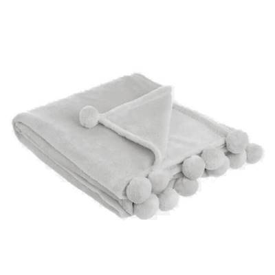 Candy plaid en flanelle gris avec pompons 130x160