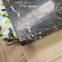 Hautma table basse carré marbre noir structure laiton